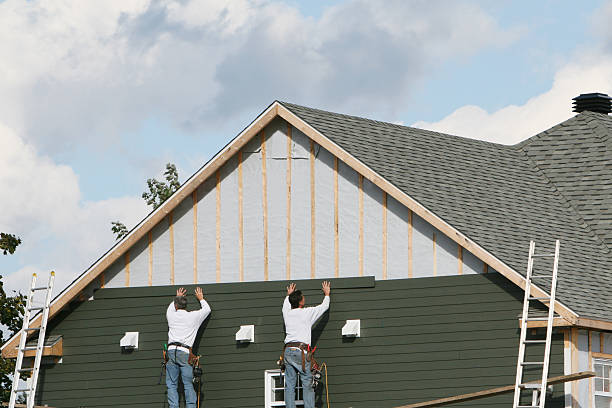 Professional Siding technician working in Harmony, NC